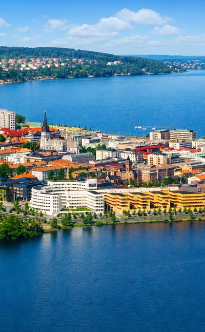 Aerial view of Jonkoping on the southern shore of Lake Vattern with a church spire and mixed rooftops