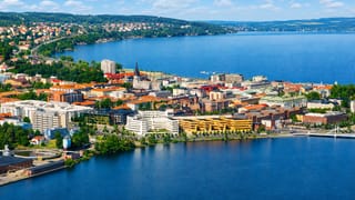Aerial view of Jonkoping on the southern shore of Lake Vattern with a church spire and mixed rooftops