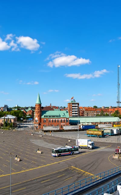 Trelleborg's harbour and port yard with the water tower and church tower on the skyline, Sweden