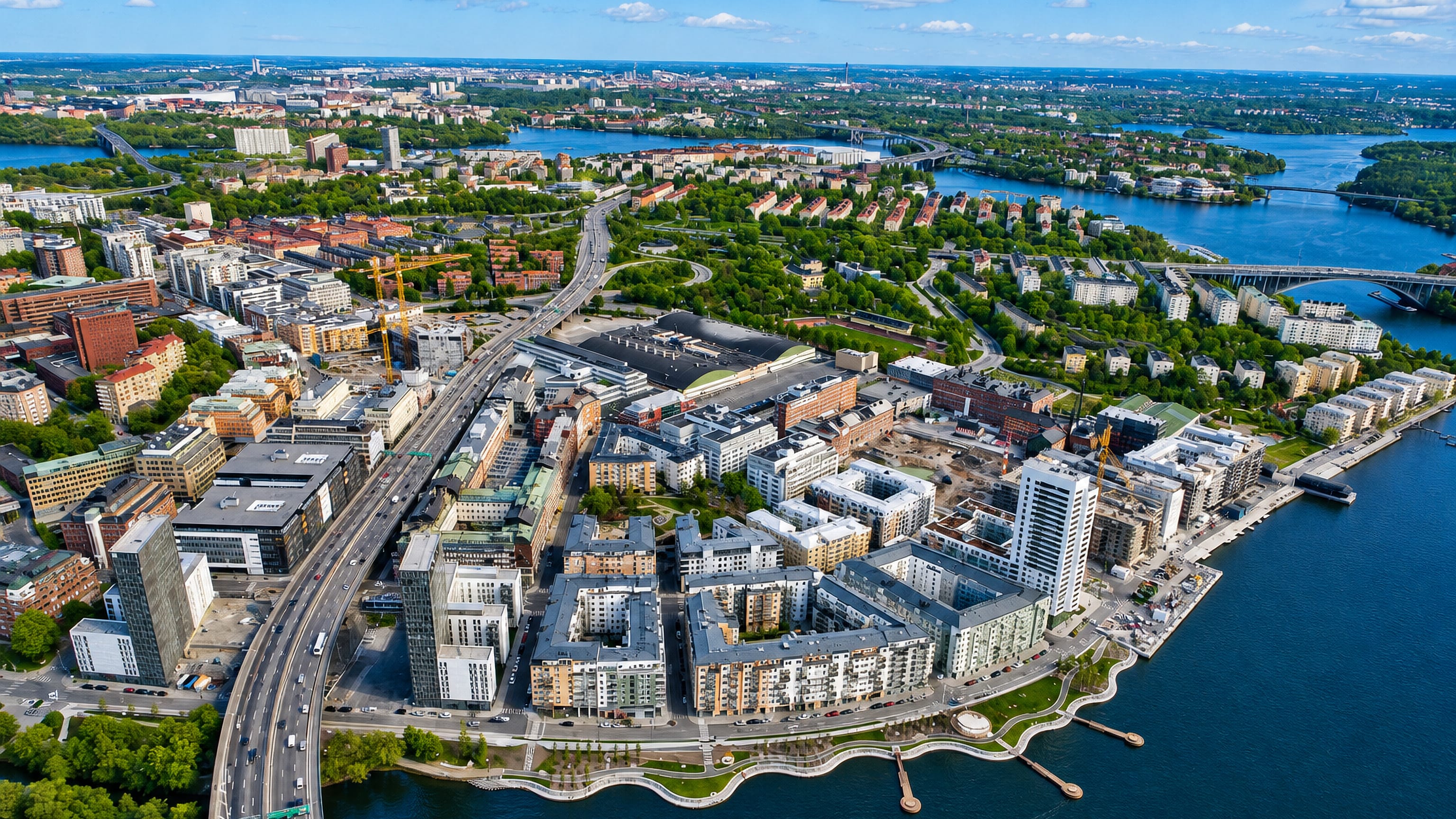 Aerial view of Hornsbergs Strand, Stockholm, its waterfront piers and apartment blocks on western Kungsholmen.