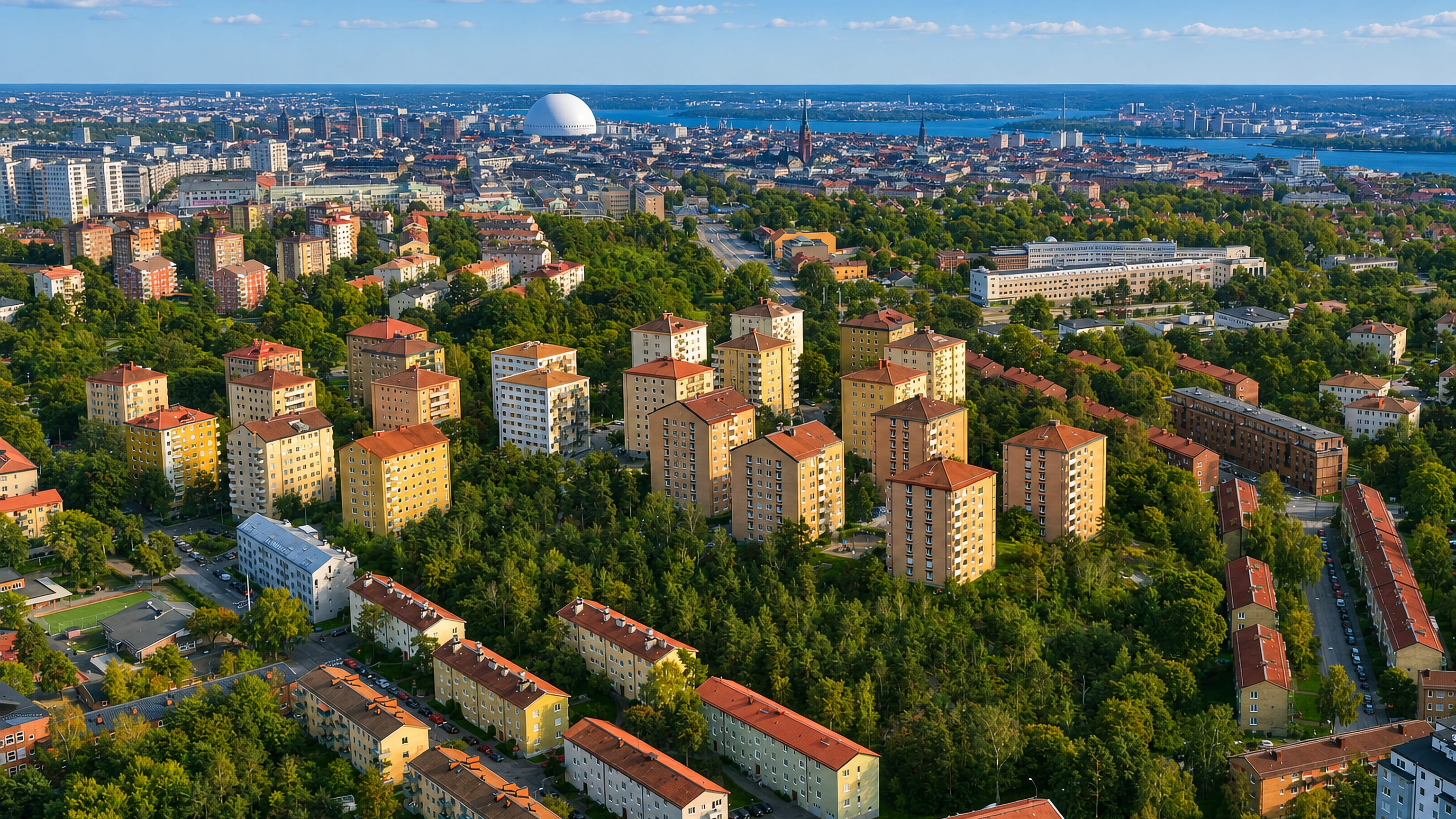 Aerial view of Johanneshov, Stockholm, with 1940s apartment blocks and the white dome of the Globen arena.