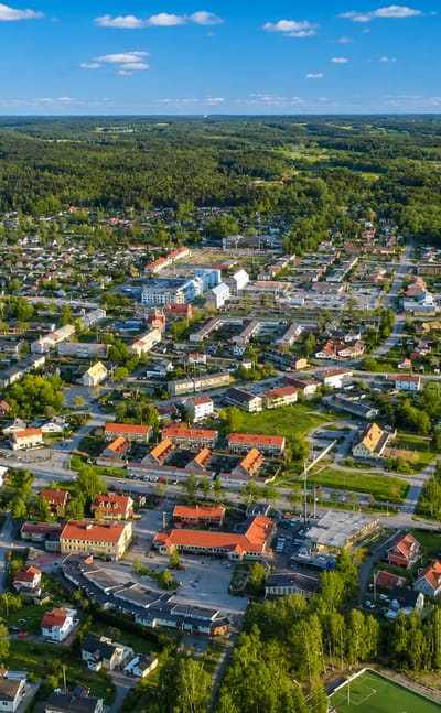 Aerial view of Lerum, a small town surrounded by forest and fields, Sweden