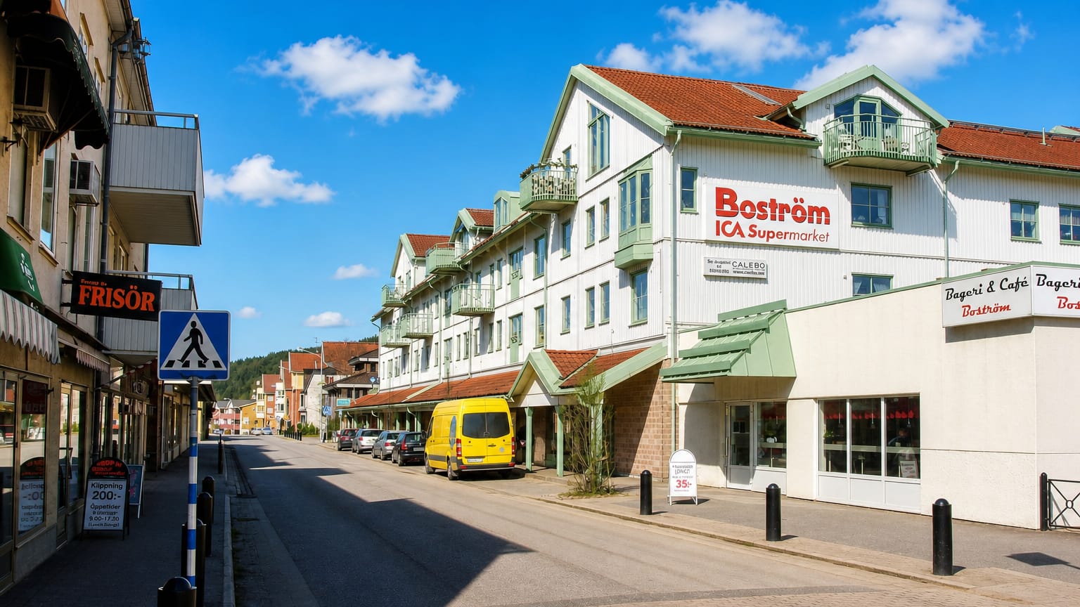 Main street with an ICA supermarket and hair salon in riverside Lilla Edet, Sweden.