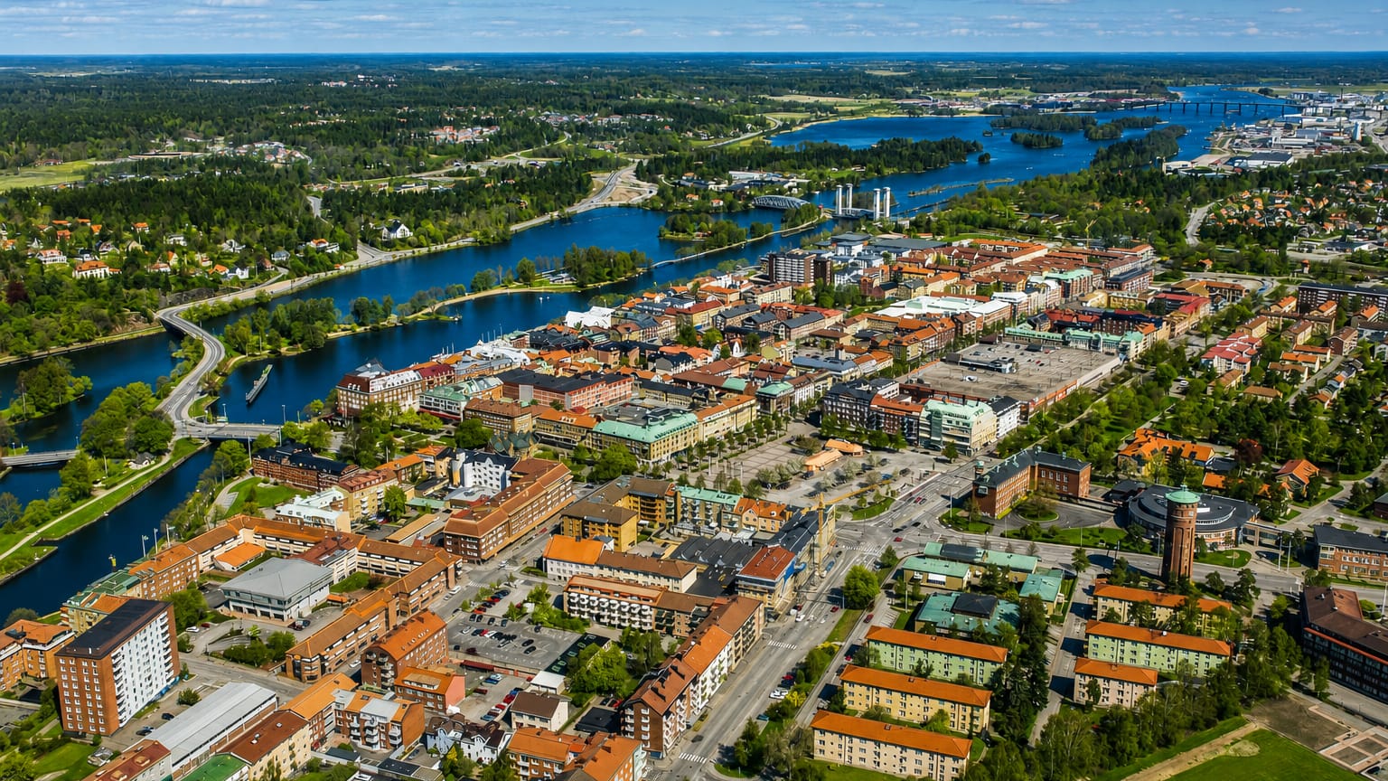 Aerial view of Trollhattan straddling the Gota river and canal locks with a distinctive round tower, Sweden.