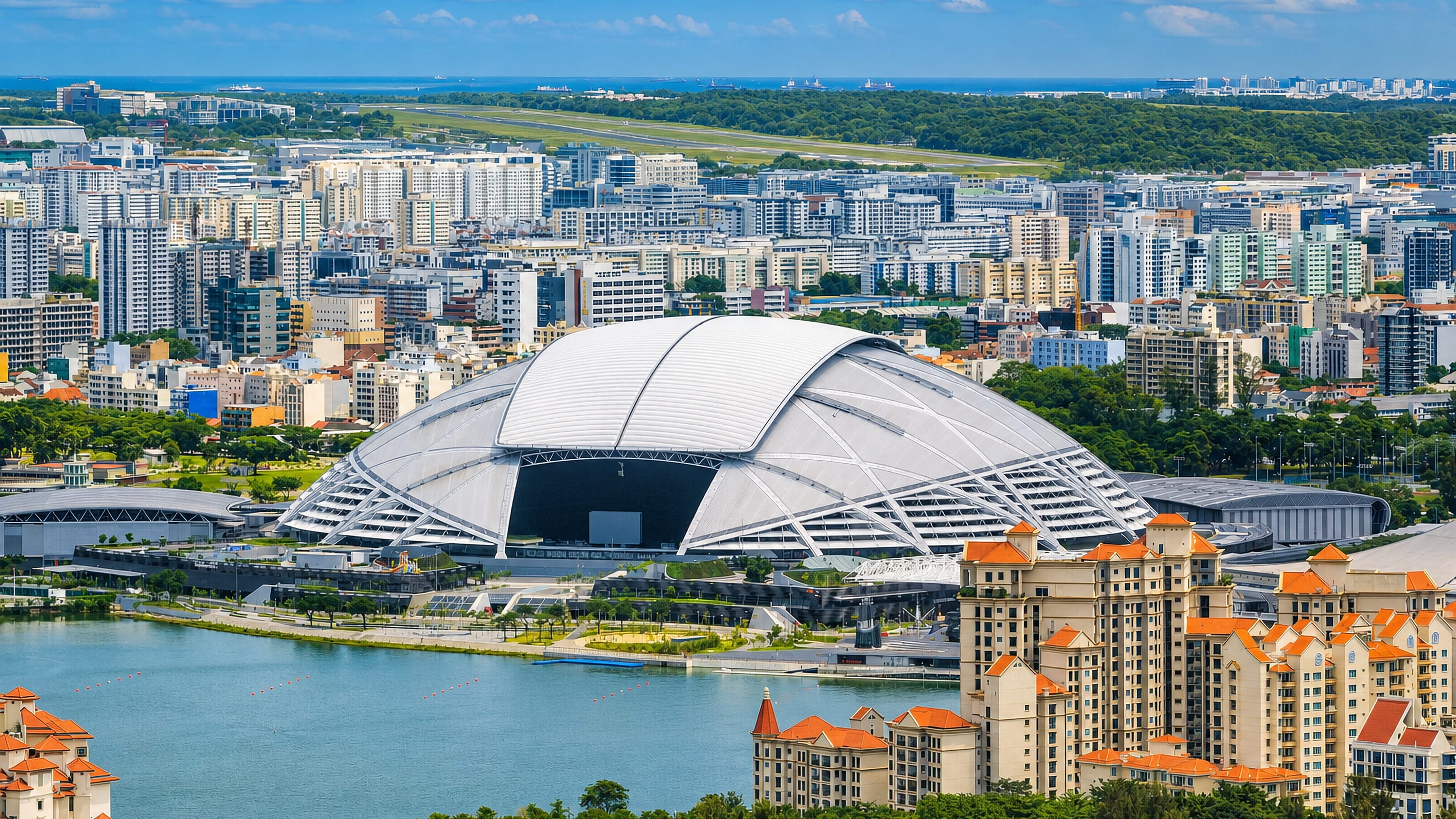 Singapore's National Stadium at Kallang, ringed by the Kallang Basin, condominium towers and city housing blocks.