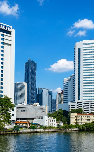 Riverside high-rises including the Golden Tulip hotel tower in Bangkok's Huai Khwang district