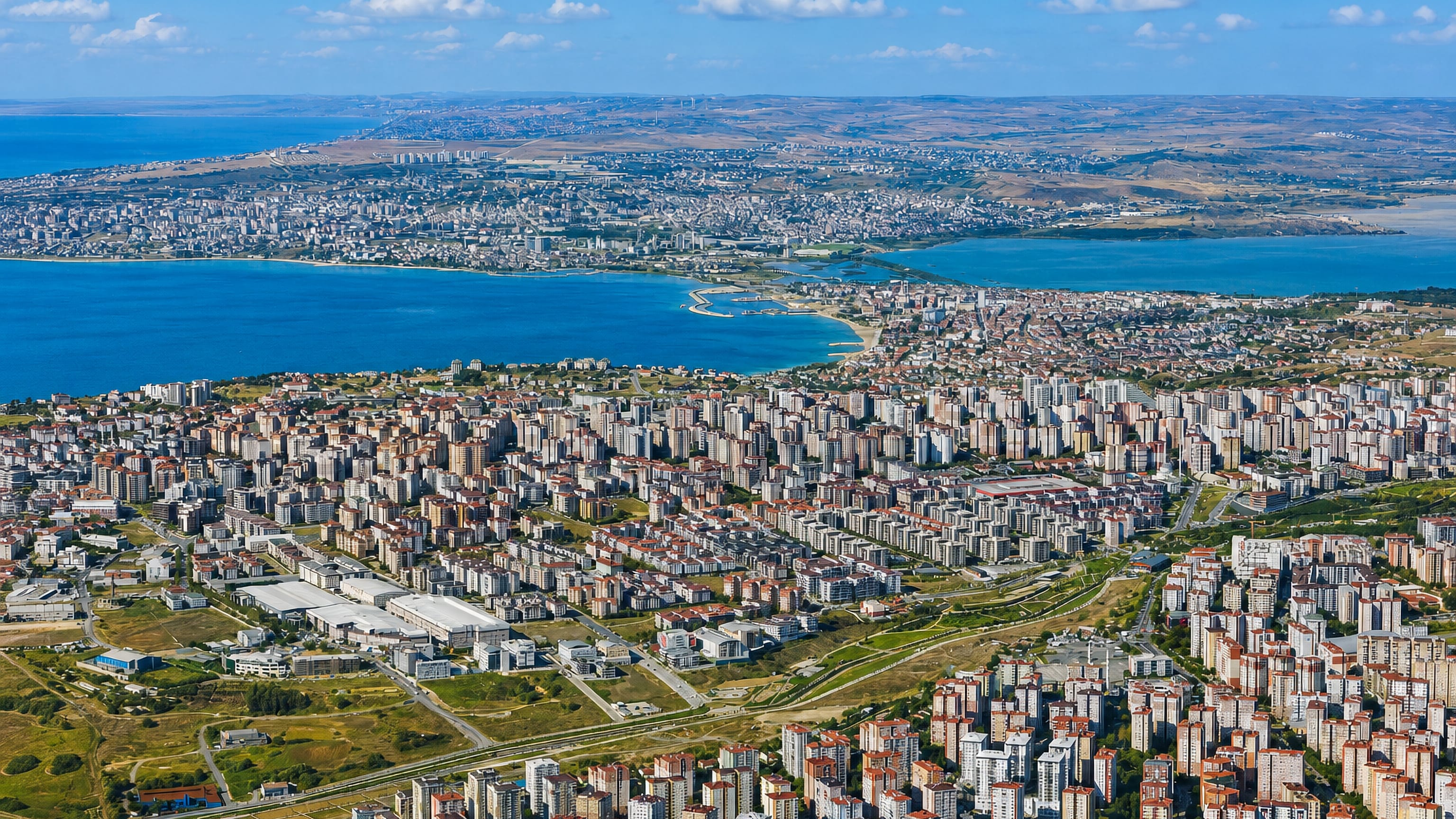 Aerial view of dense apartment blocks lining the bay at Büyükçekmece on Istanbul's Marmara coast.