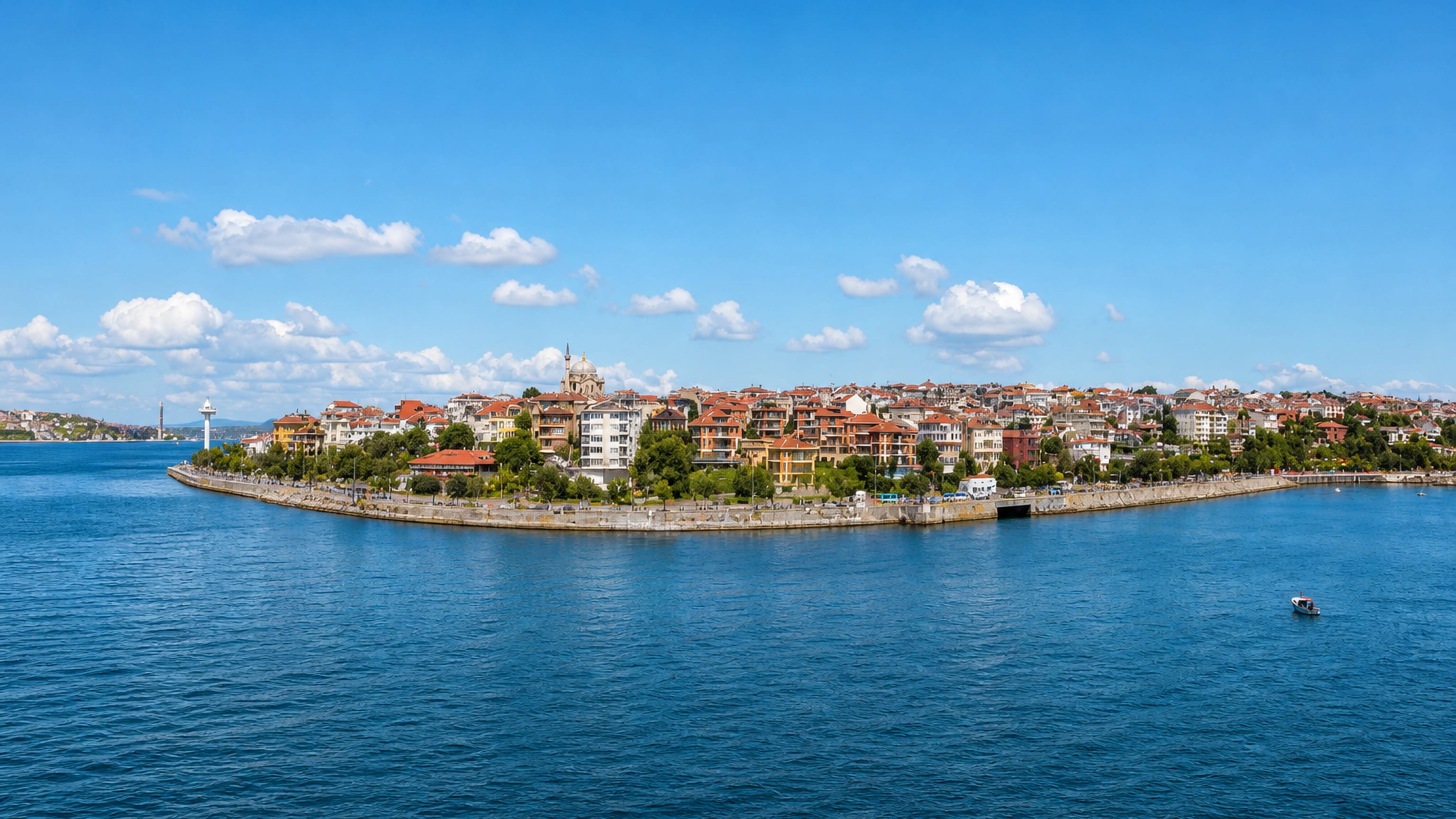 The Salacak waterfront promenade in Uskudar curving along the Bosphorus below red-roofed Istanbul houses