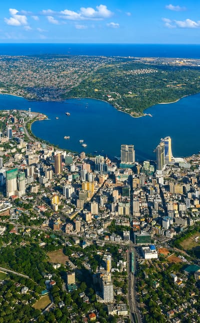 Aerial view of Dar es Salaam's downtown, natural harbour and container port on the Indian Ocean