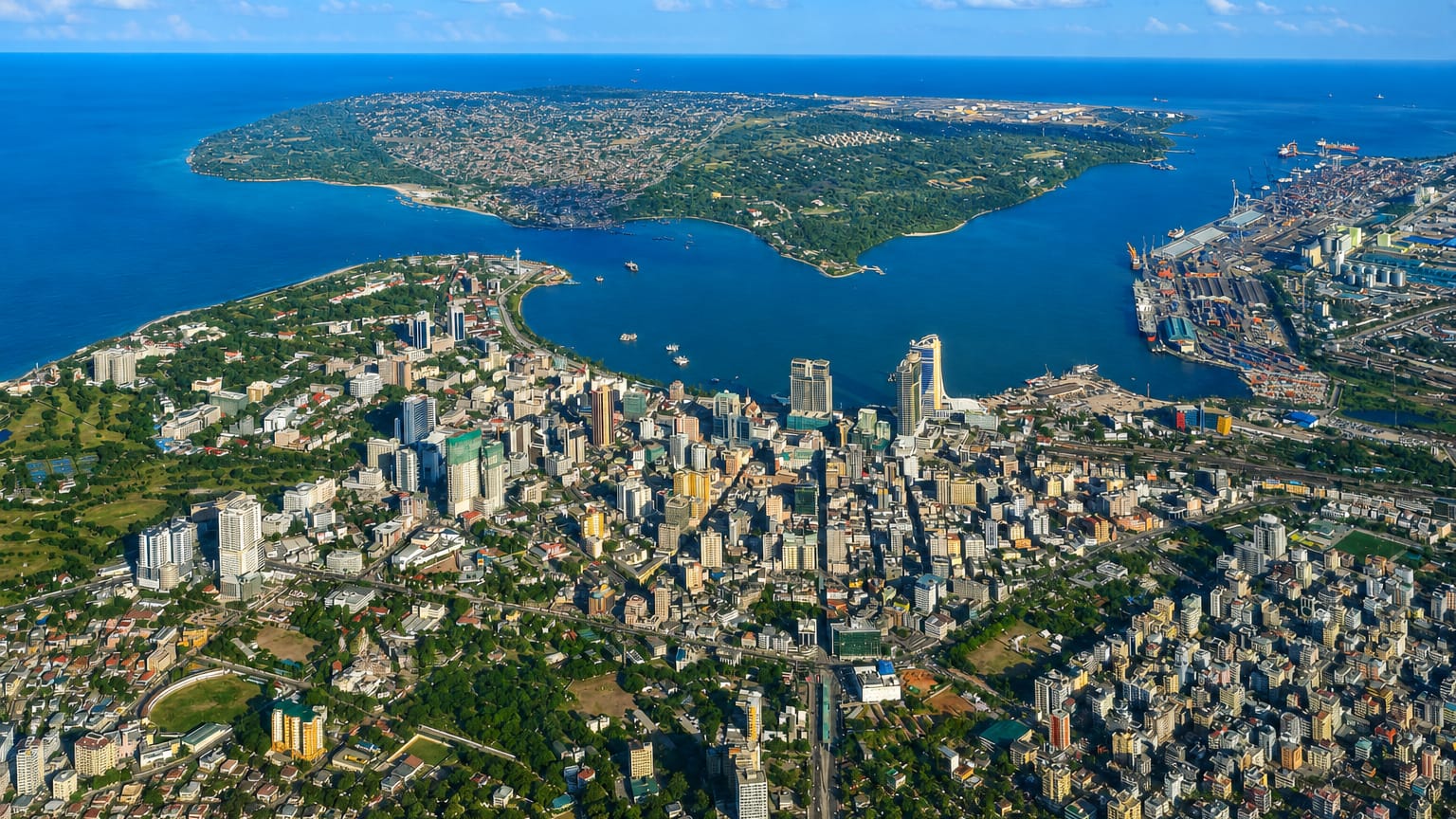 Aerial view of Dar es Salaam's downtown, natural harbour and container port on the Indian Ocean