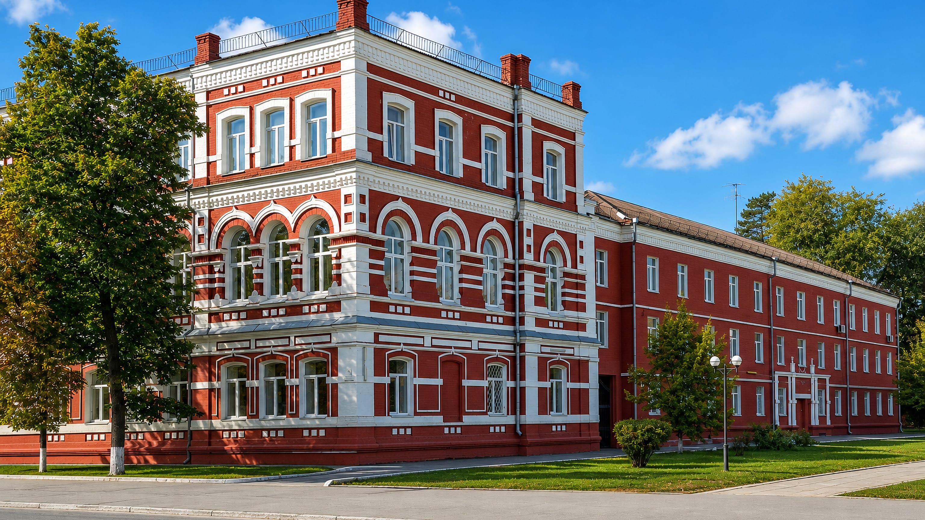 Ornate red-brick 19th-century building on a quiet street corner in Samar, Ukraine.