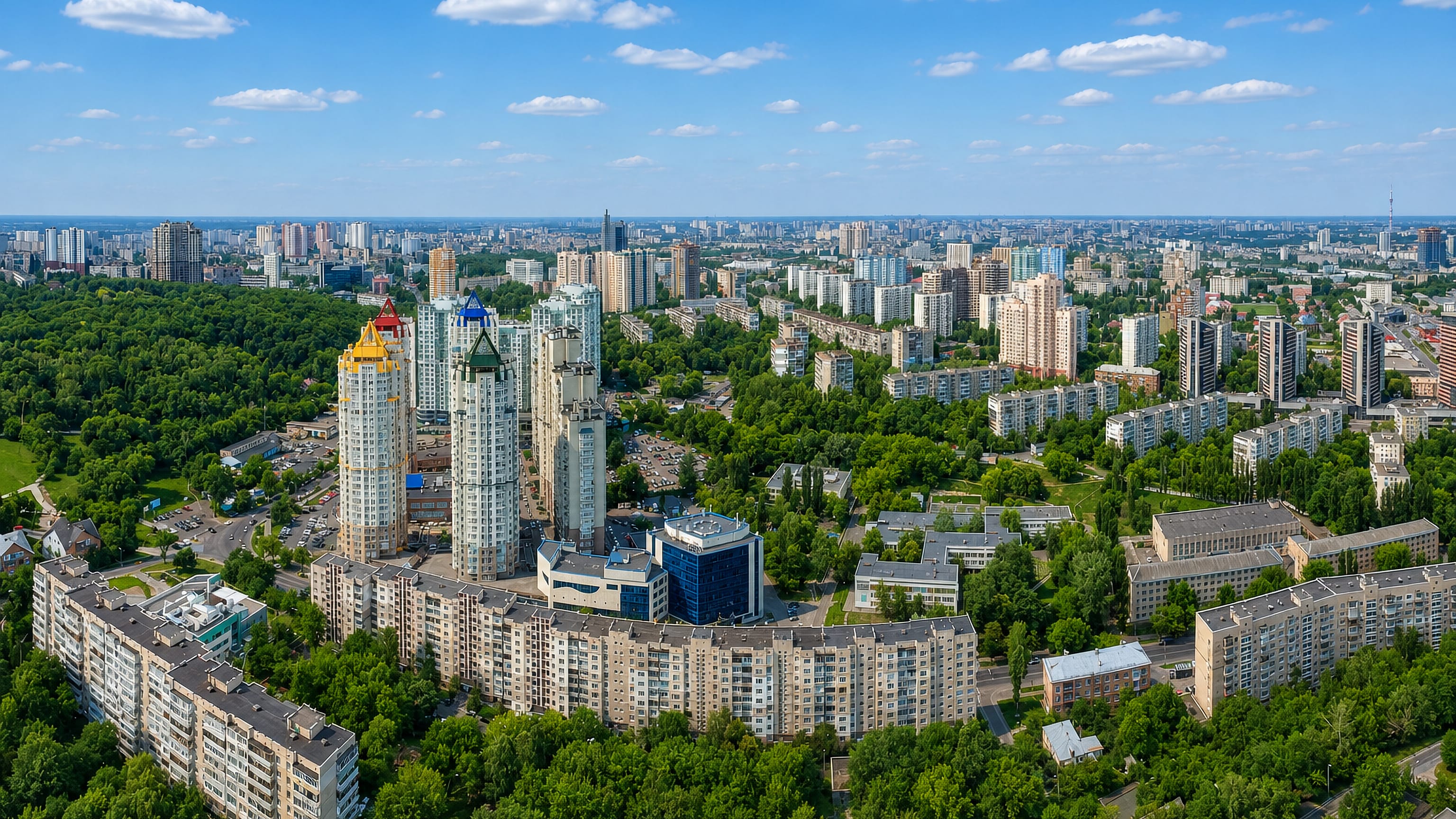 Aerial view of Solomianka Raion, Kyiv, with colour-roofed high-rises, Soviet-era blocks and leafy courtyards