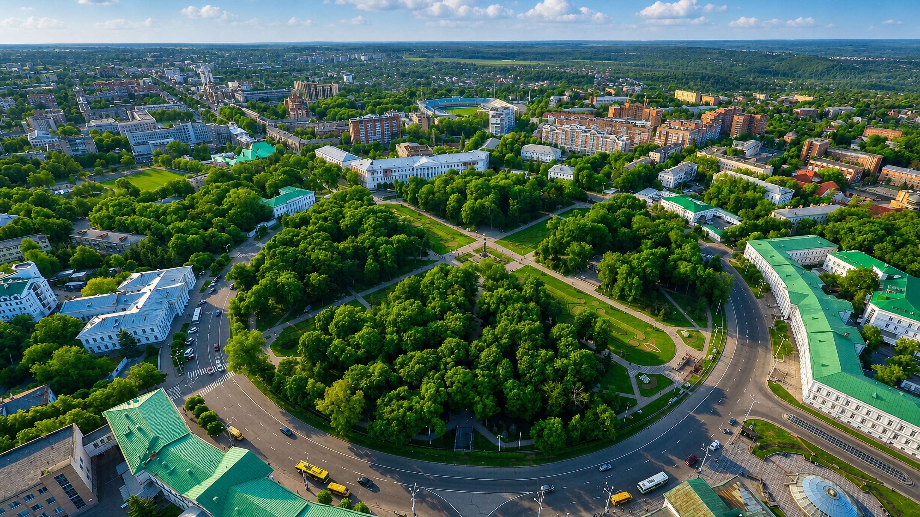 Aerial view of Poltava, Ukraine, showing the circular Round Square with roads radiating around a wooded central park