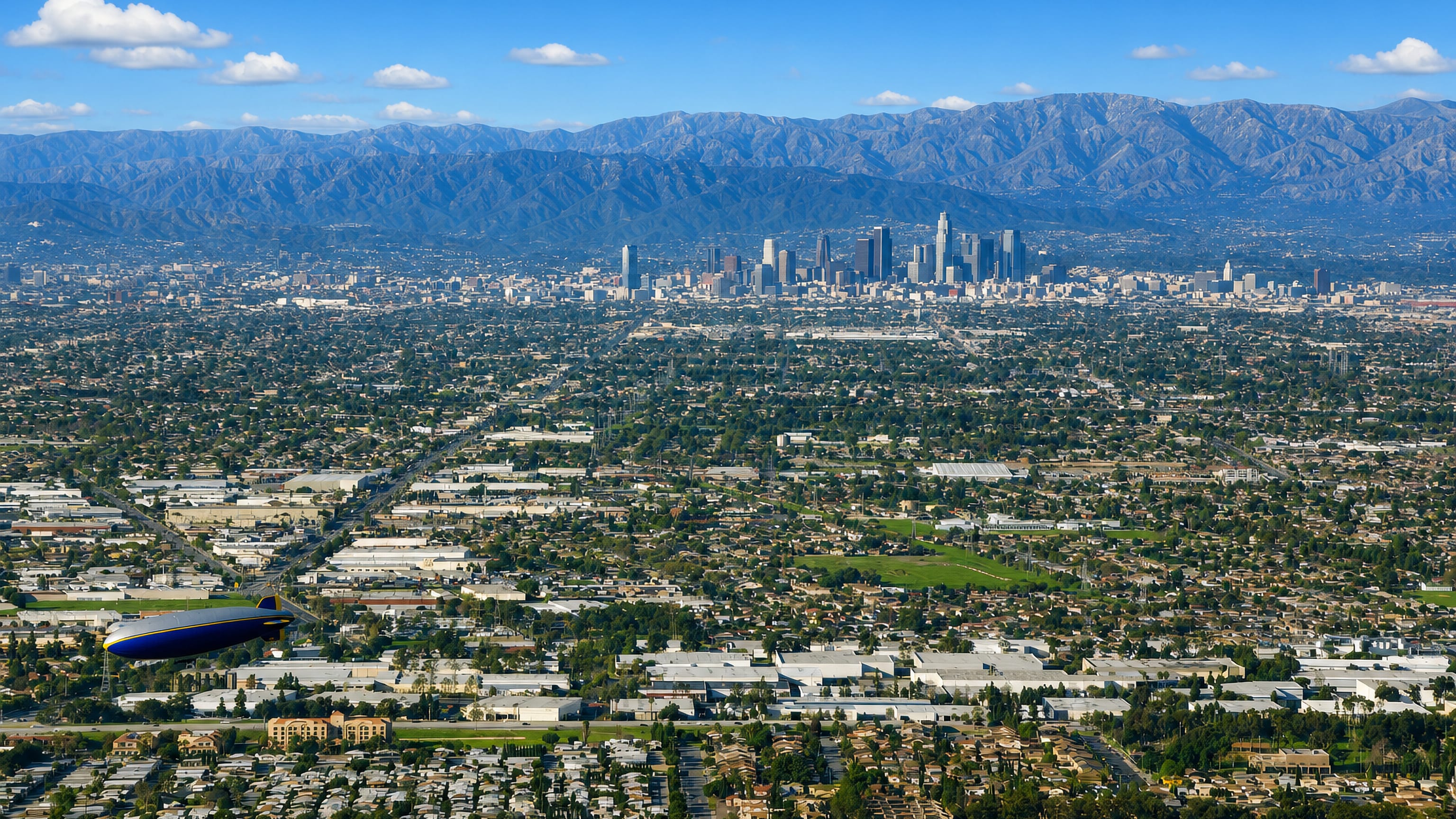 Carson, California, looking across the Los Angeles basin to the downtown skyline and San Gabriel Mountains.