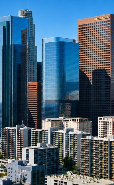 Downtown Los Angeles high-rise cluster with the US Bank and Wells Fargo towers on a sunny day.