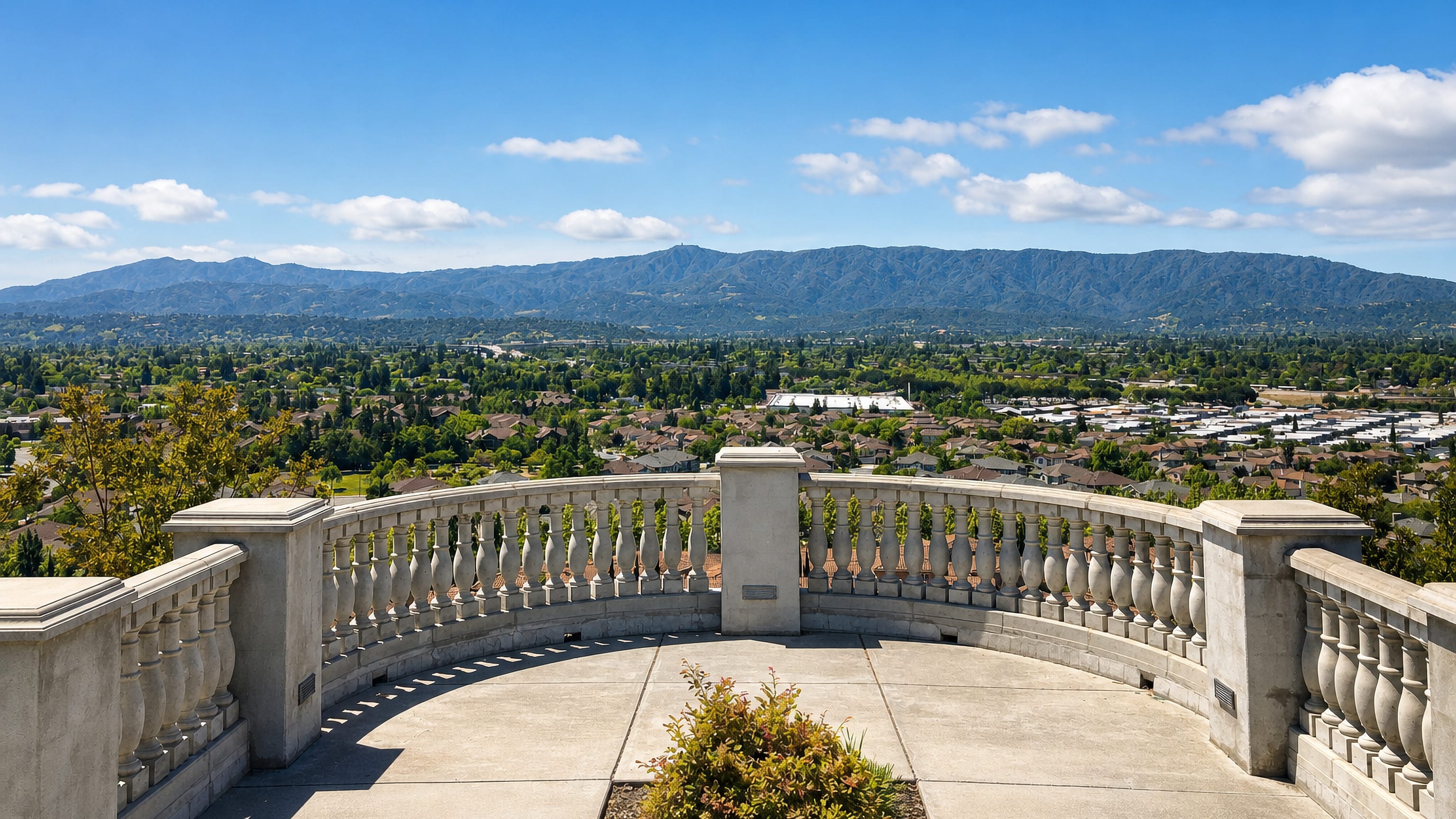 Balustraded hilltop overlook at Communications Hill, San Jose, above the valley and Santa Cruz Mountains.