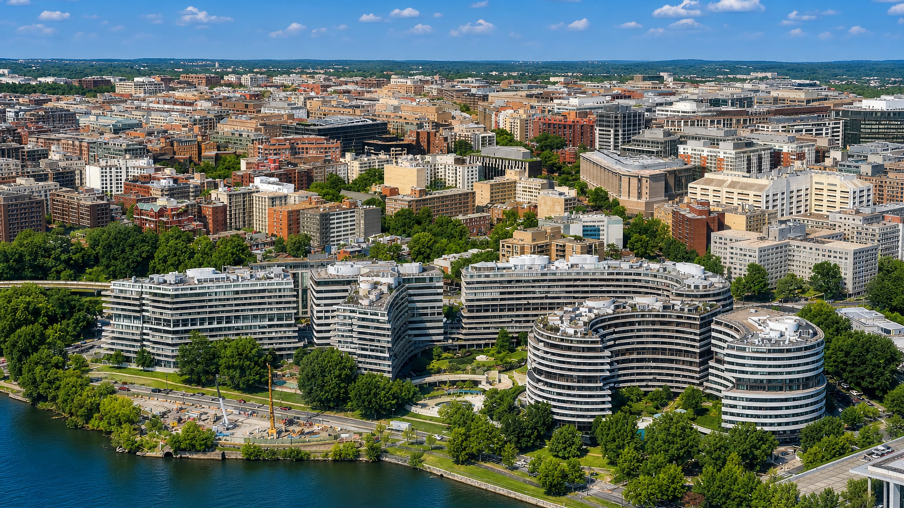 Aerial view over the curved Watergate complex and the Potomac riverfront in Foggy Bottom, Washington, DC.