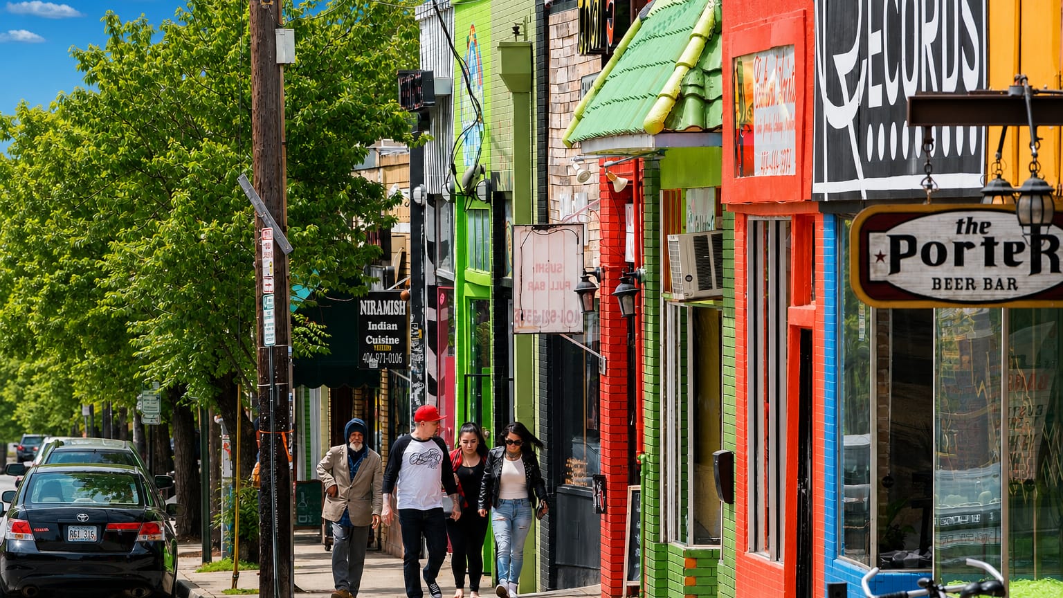Colorful independent shops and record stores along a lively street in Little Five Points, Atlanta