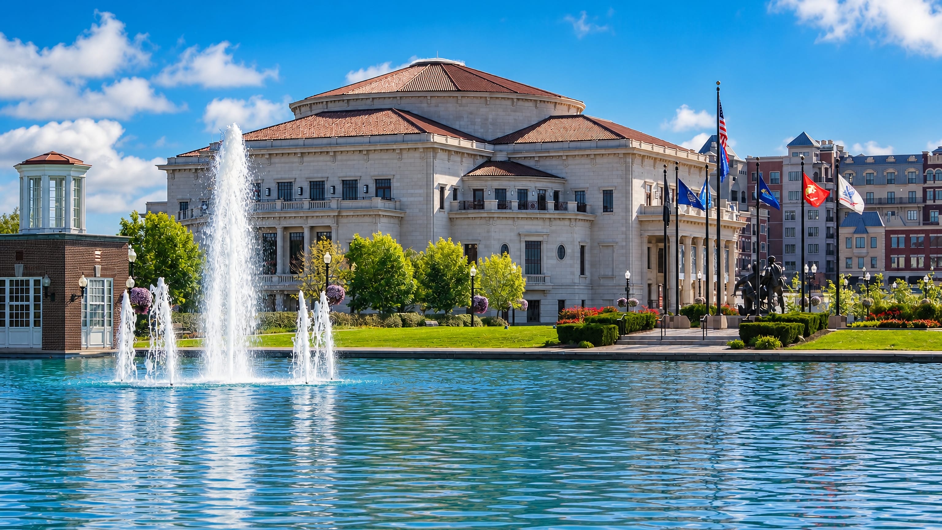 The domed limestone Palladium concert hall and its fountain pool at Carmel City Center, Indiana.