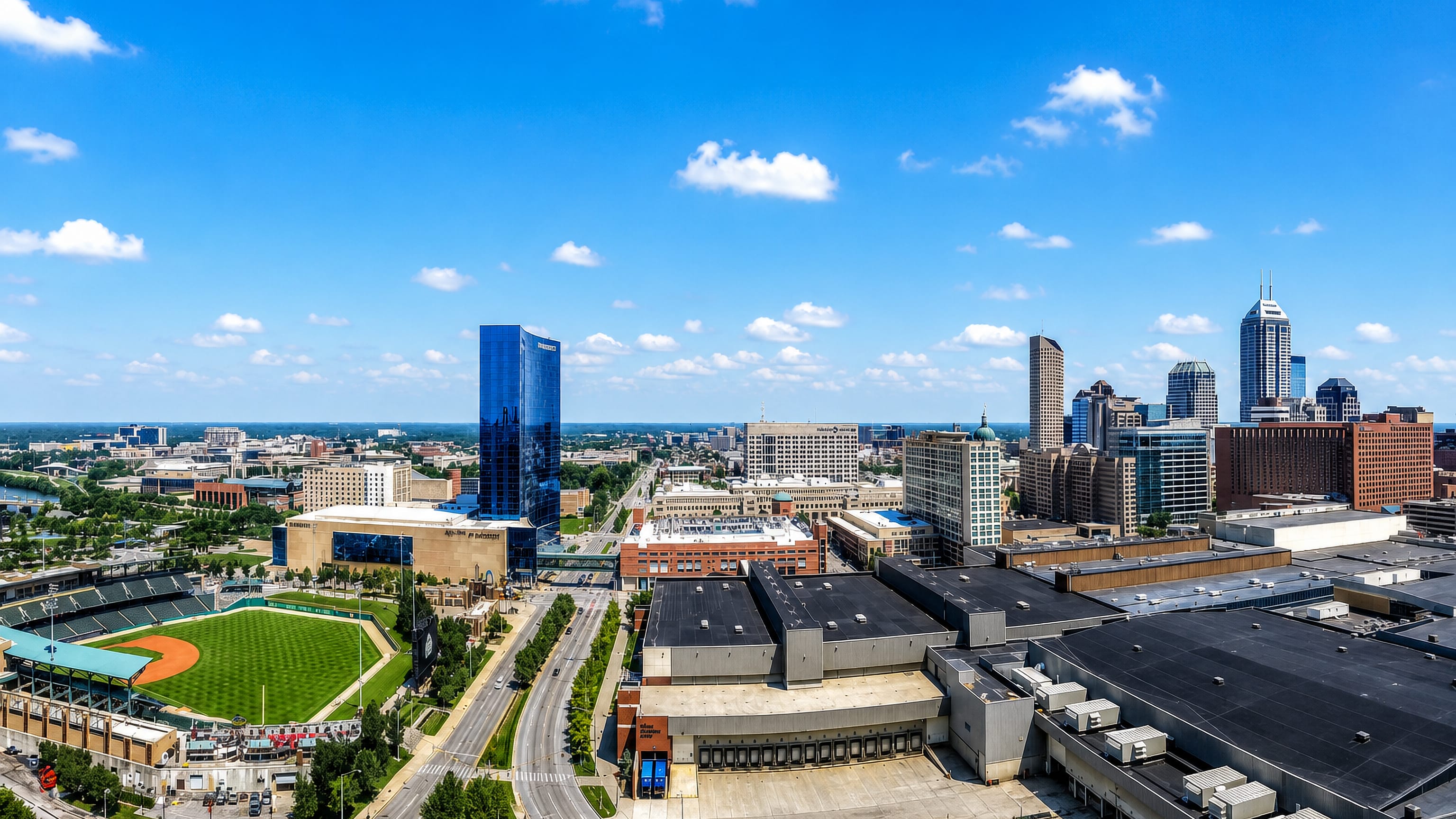 Downtown Indianapolis skyline with the blue JW Marriott tower and Victory Field ballpark.