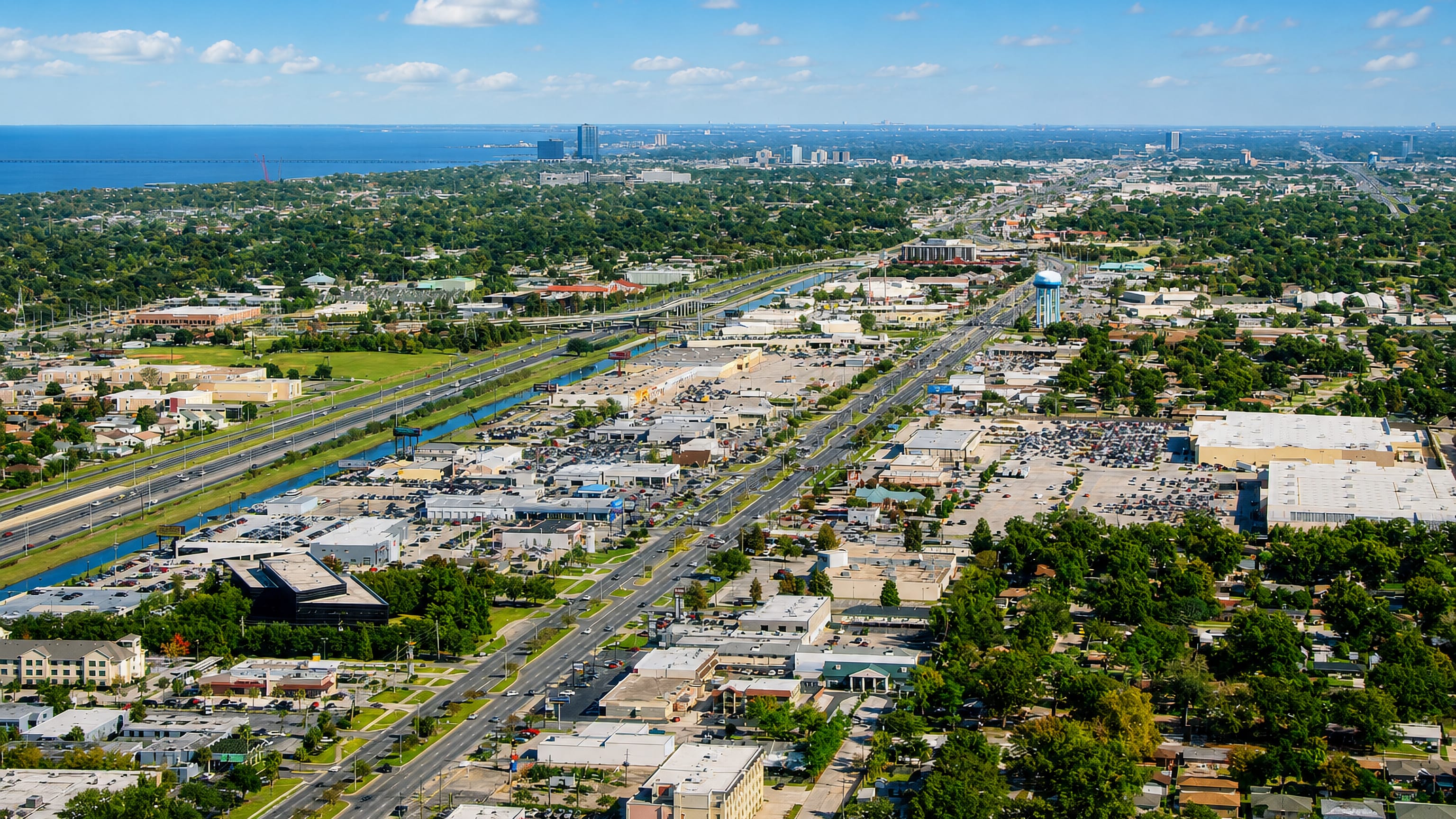 Aerial view of Metairie, Louisiana, its drainage canal and boulevard running toward Lake Pontchartrain.
