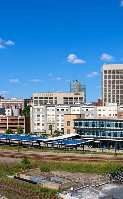 Worcester, Massachusetts, skyline with the Union Station rail yard in the foreground and mid-rise towers beyond.