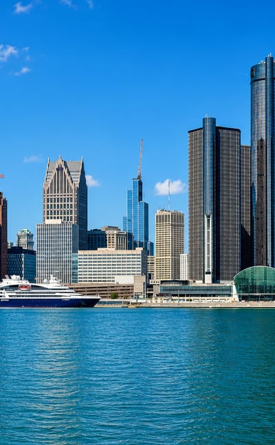 Downtown Detroit skyline with the Renaissance Center towers rising over the Detroit River