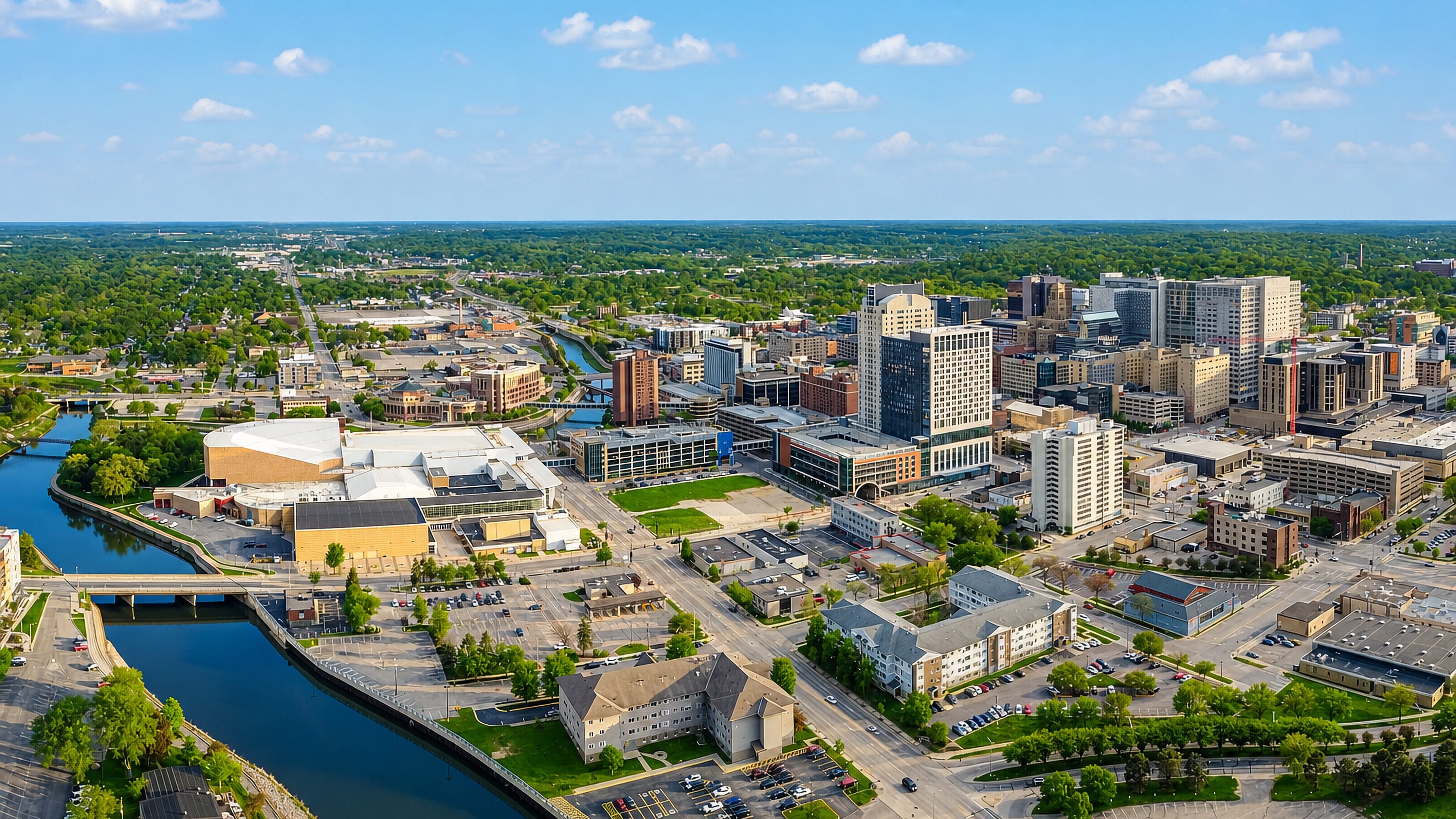 Aerial view of downtown Rochester, Minnesota, with the Zumbro River, civic center and Mayo Clinic towers.