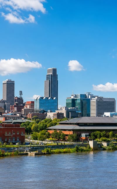 Downtown Omaha, Nebraska skyline led by the First National Bank Tower rising above the Missouri River waterfront