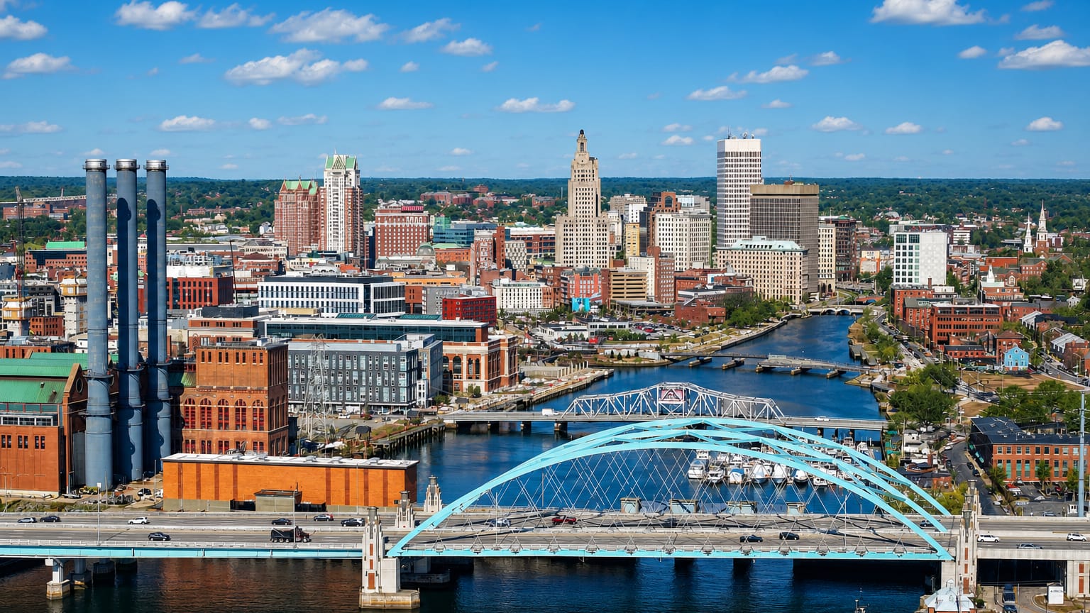 Skyline of Providence, Rhode Island, with its teal river bridge, art-deco tower and power-plant smokestacks