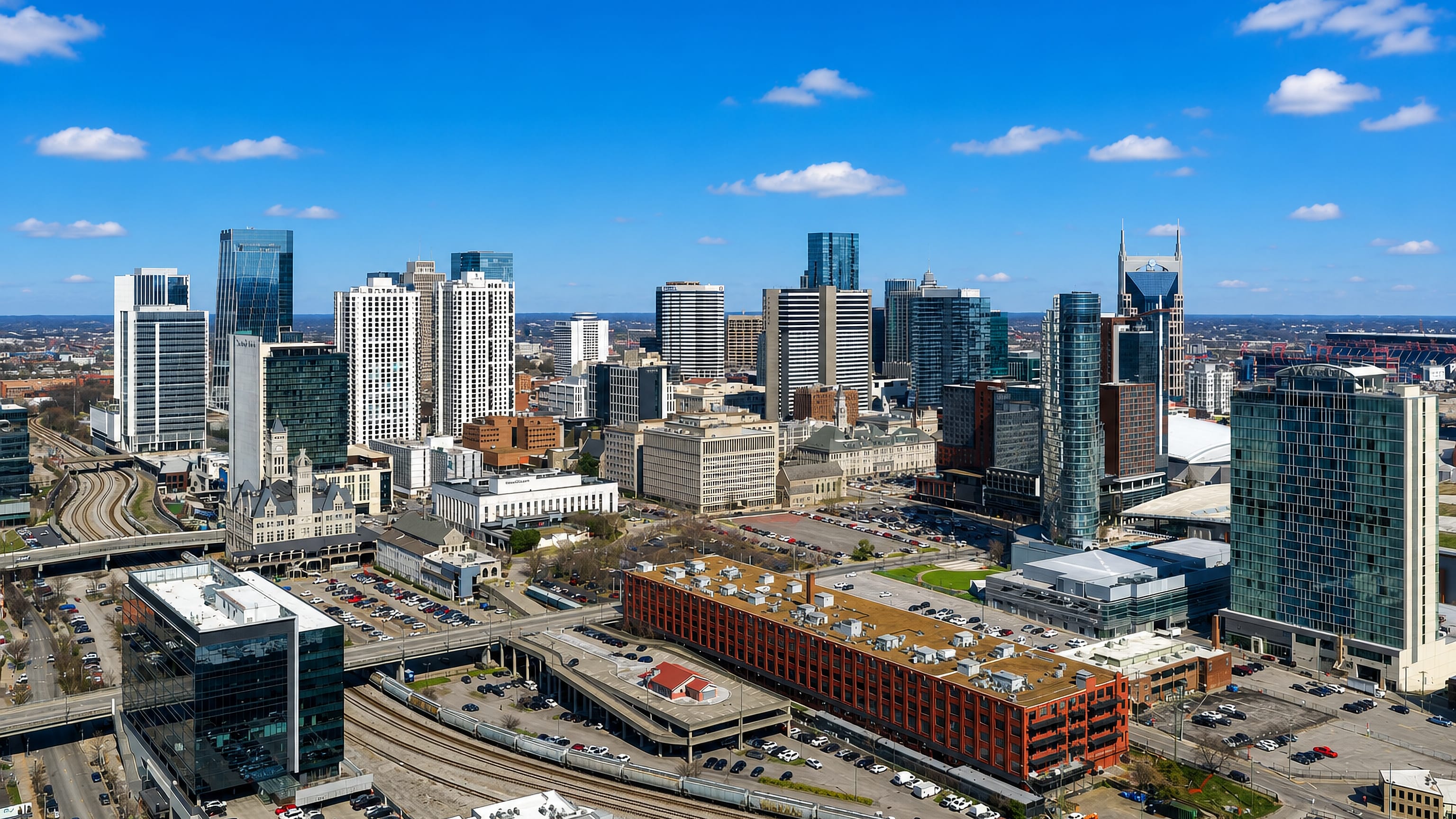 Downtown Nashville's skyline and rail yards, with the AT&T tower, seen from the Inglewood side.