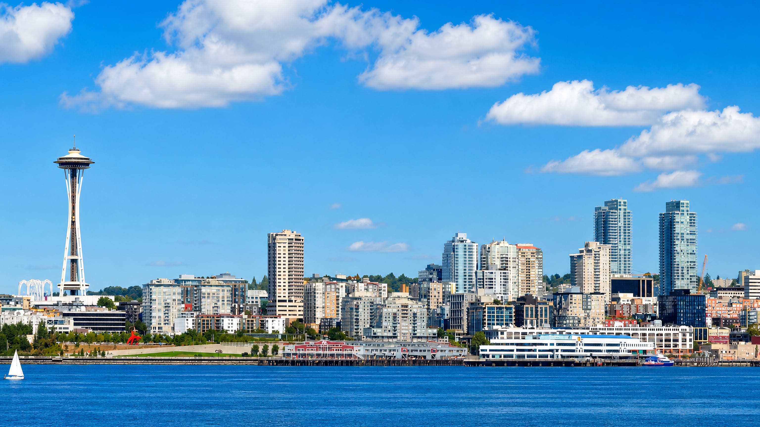 Belltown's waterfront high-rises and the Space Needle seen across Elliott Bay in Seattle.