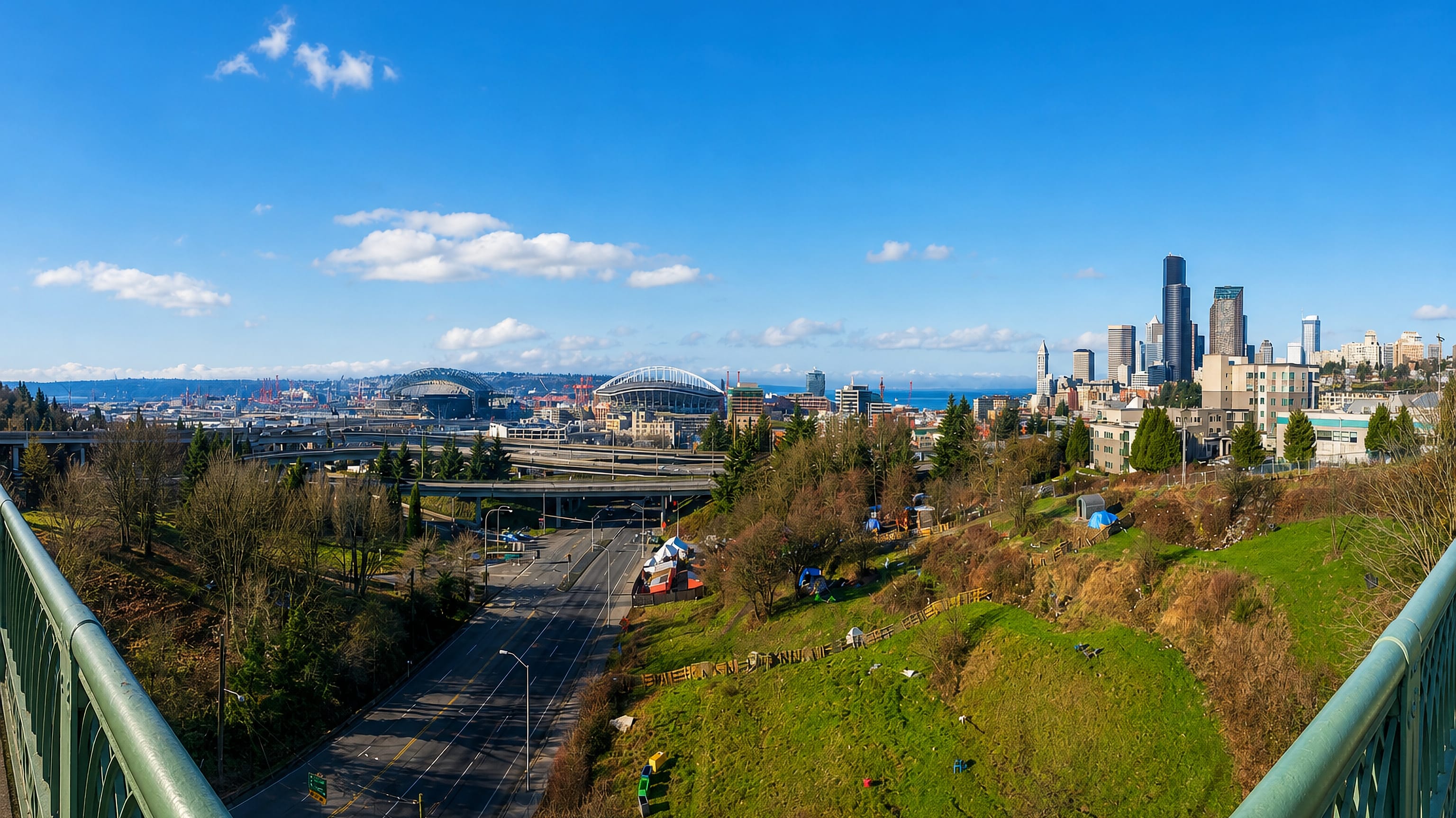 Seattle's skyline and stadiums seen from the bridge above the Chinatown-International District.