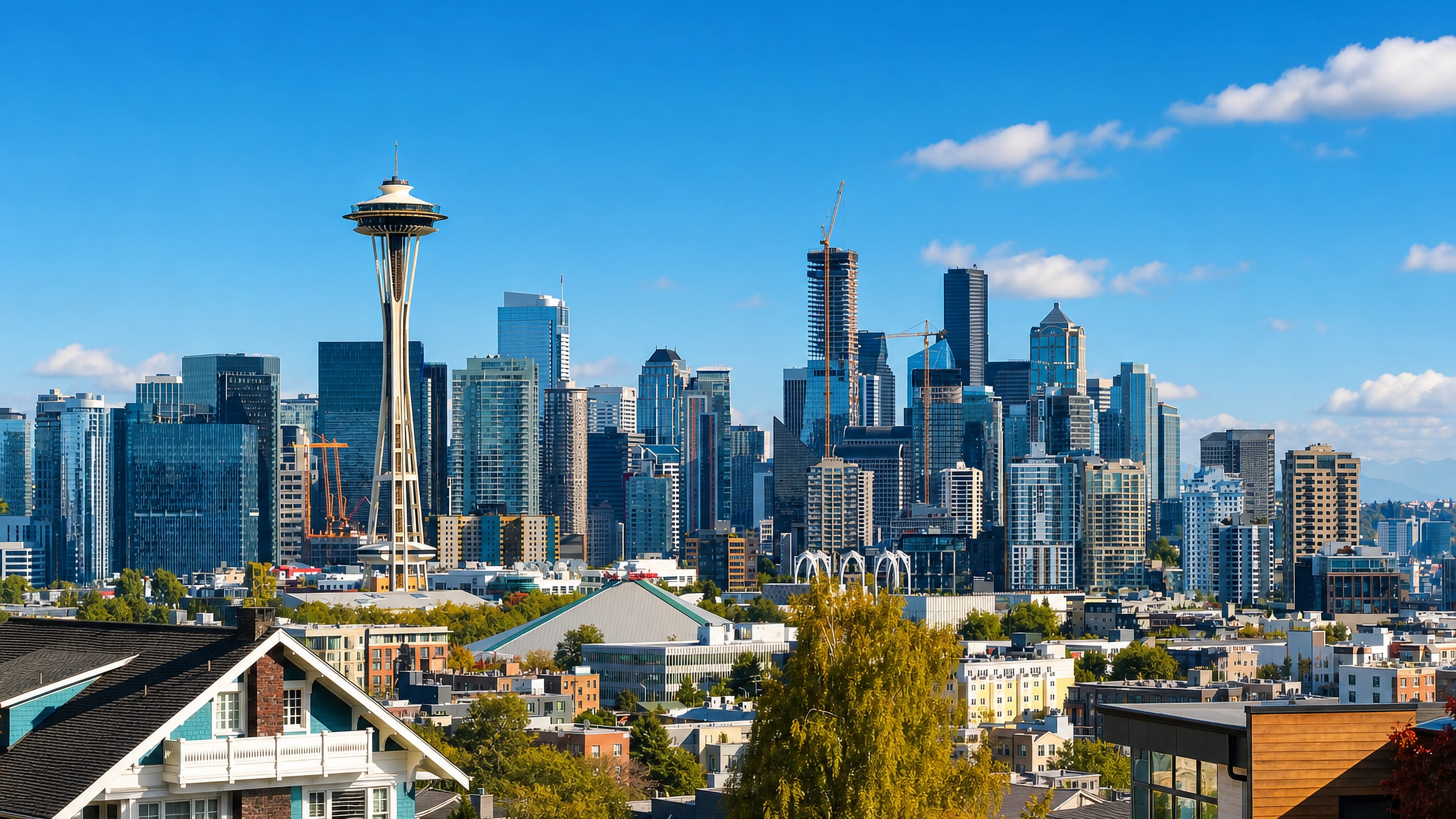 Seattle's downtown skyline and the Space Needle rising beyond Queen Anne's craftsman rooftops.
