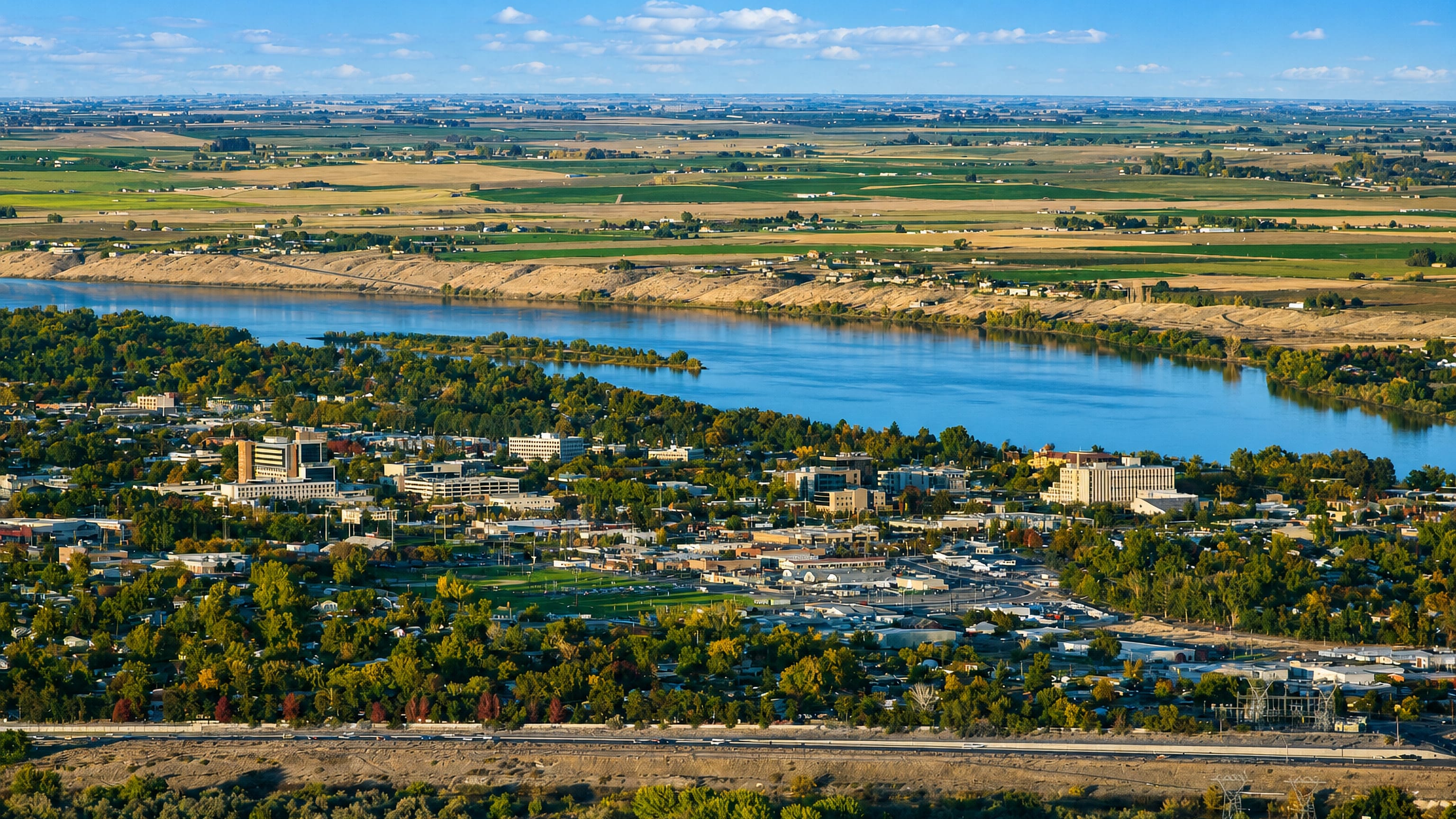The Tri-Cities, Washington, on the Columbia River with irrigated farmland across the far bank.