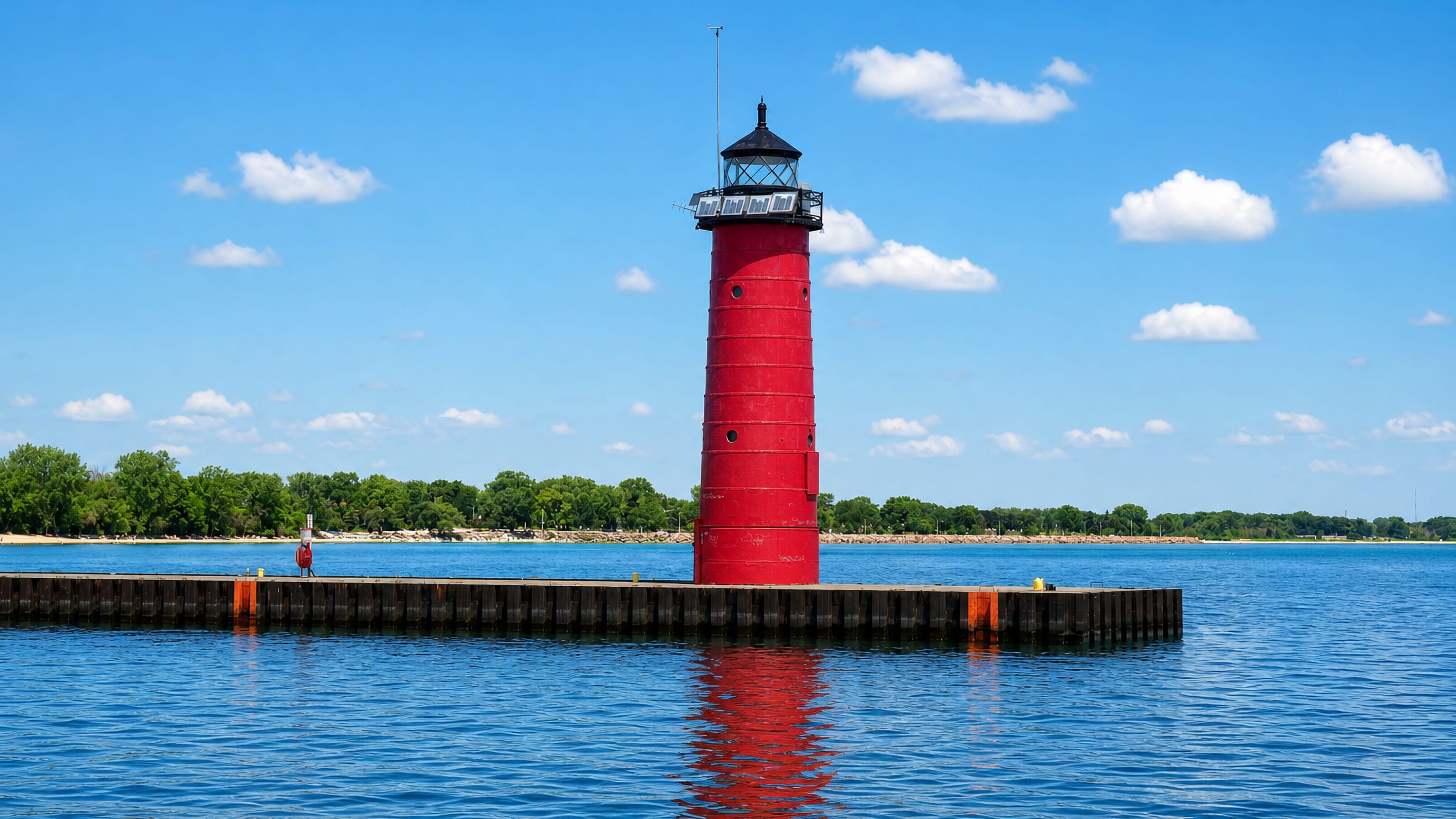 The red North Pier lighthouse at the end of Kenosha's breakwater on Lake Michigan.
