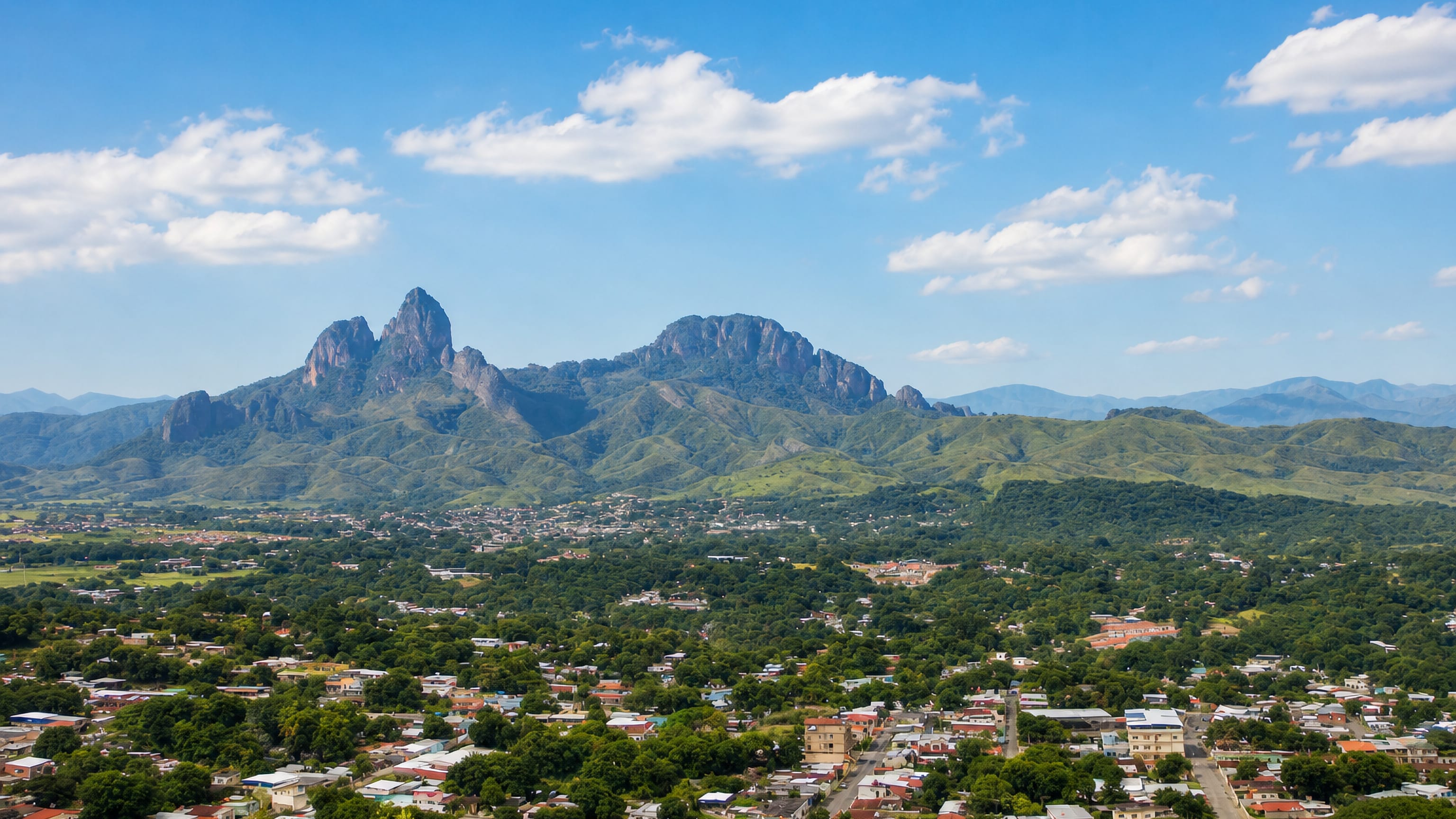 San Juan de los Morros spreads below the jagged rock peaks of Los Morros in the Venezuelan hills.