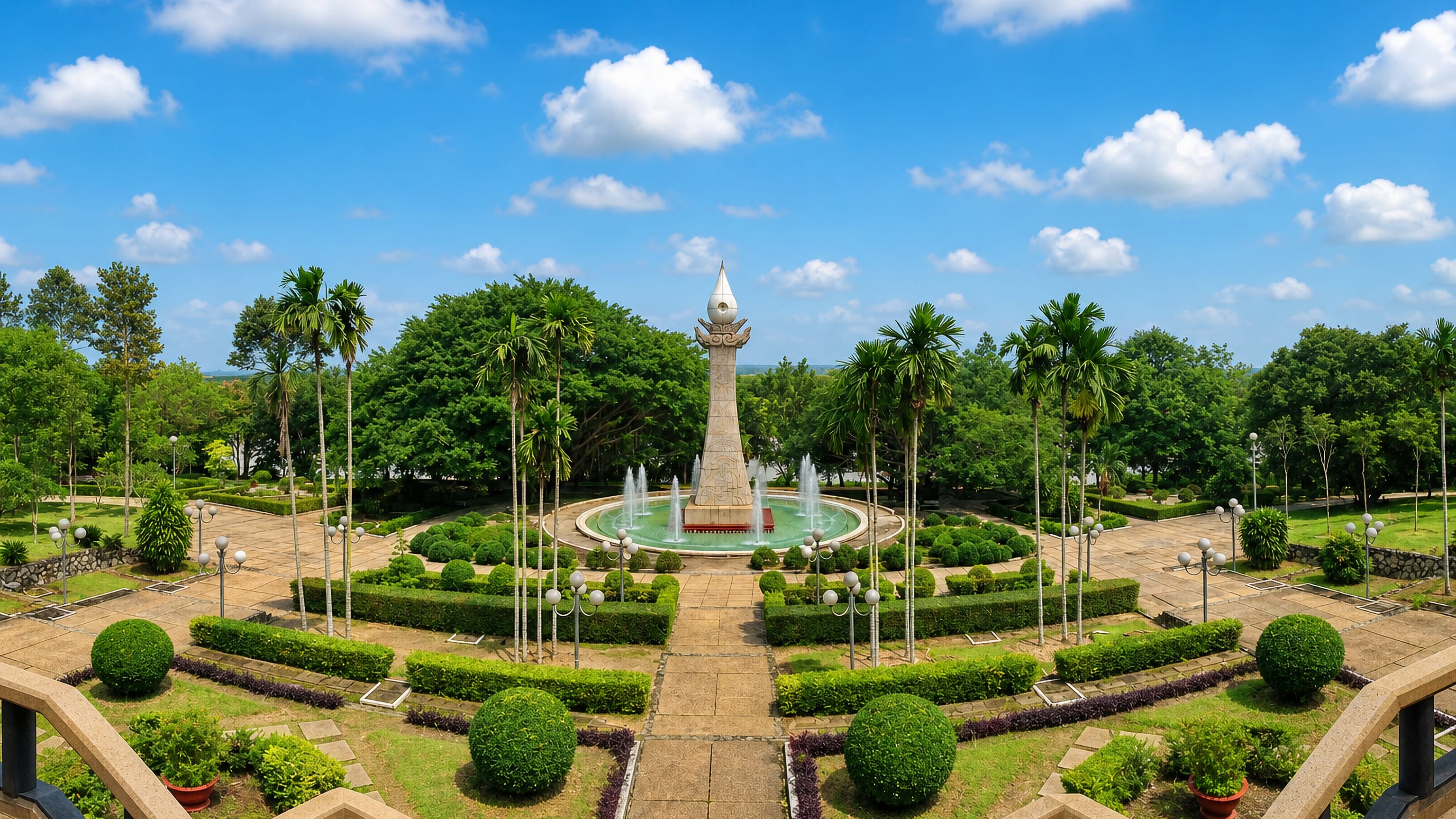 Landscaped memorial park with an obelisk and fountain in Cu Chi, outside Ho Chi Minh City