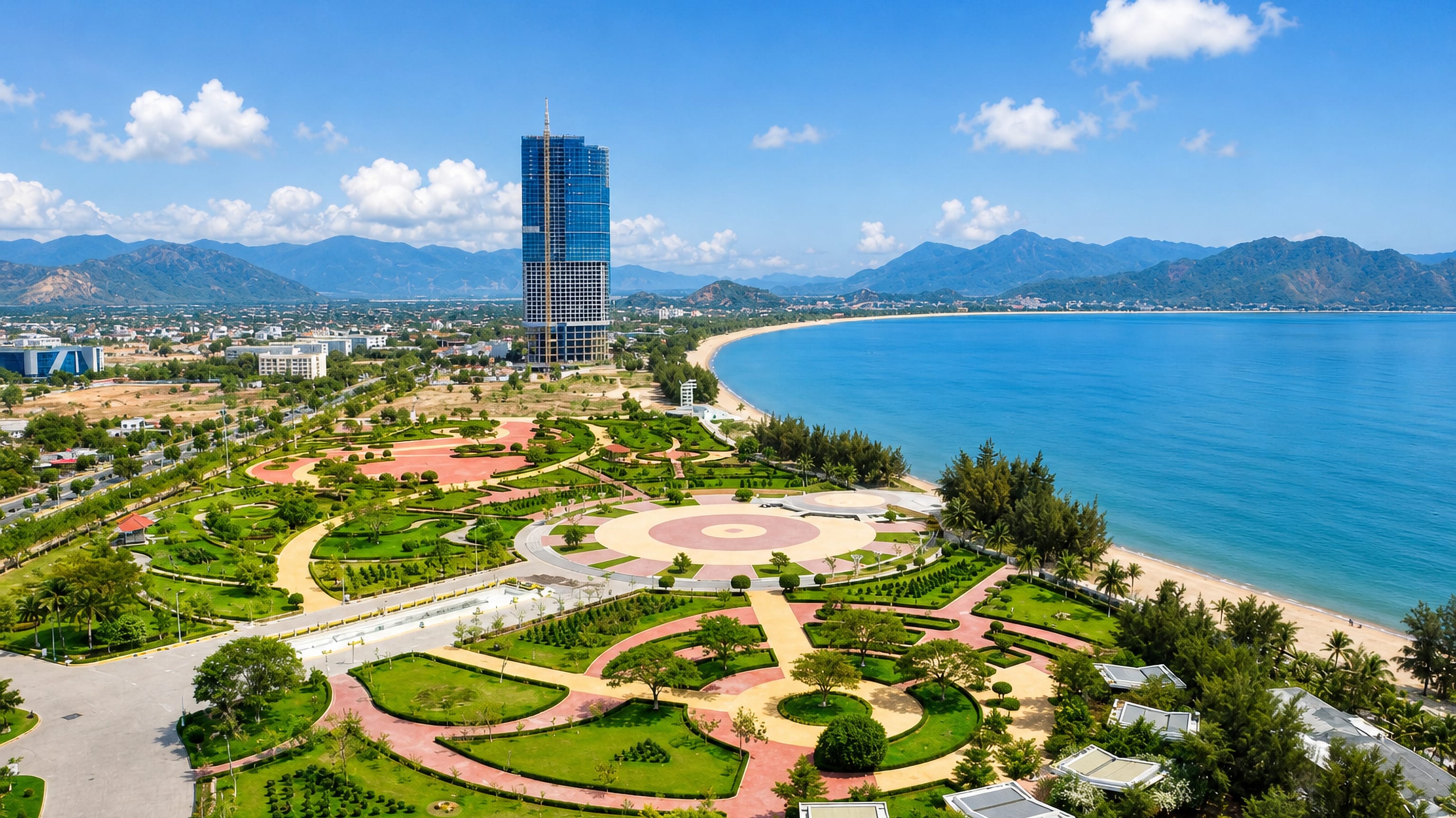 Beachfront park and landmark tower above the curving bay at Phan Rang-Thap Cham, Vietnam.