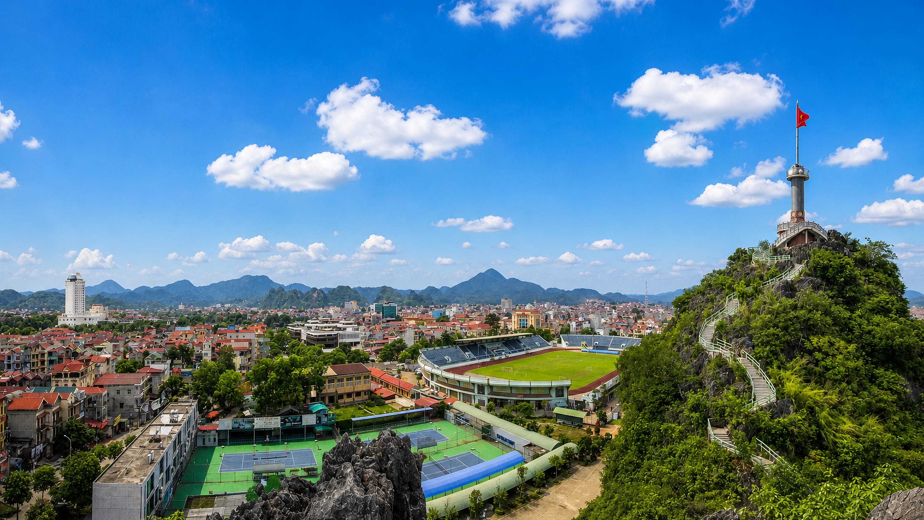 Lạng Sơn seen from the flag tower on Phai Vệ rock, overlooking the stadium and surrounding karst hills.