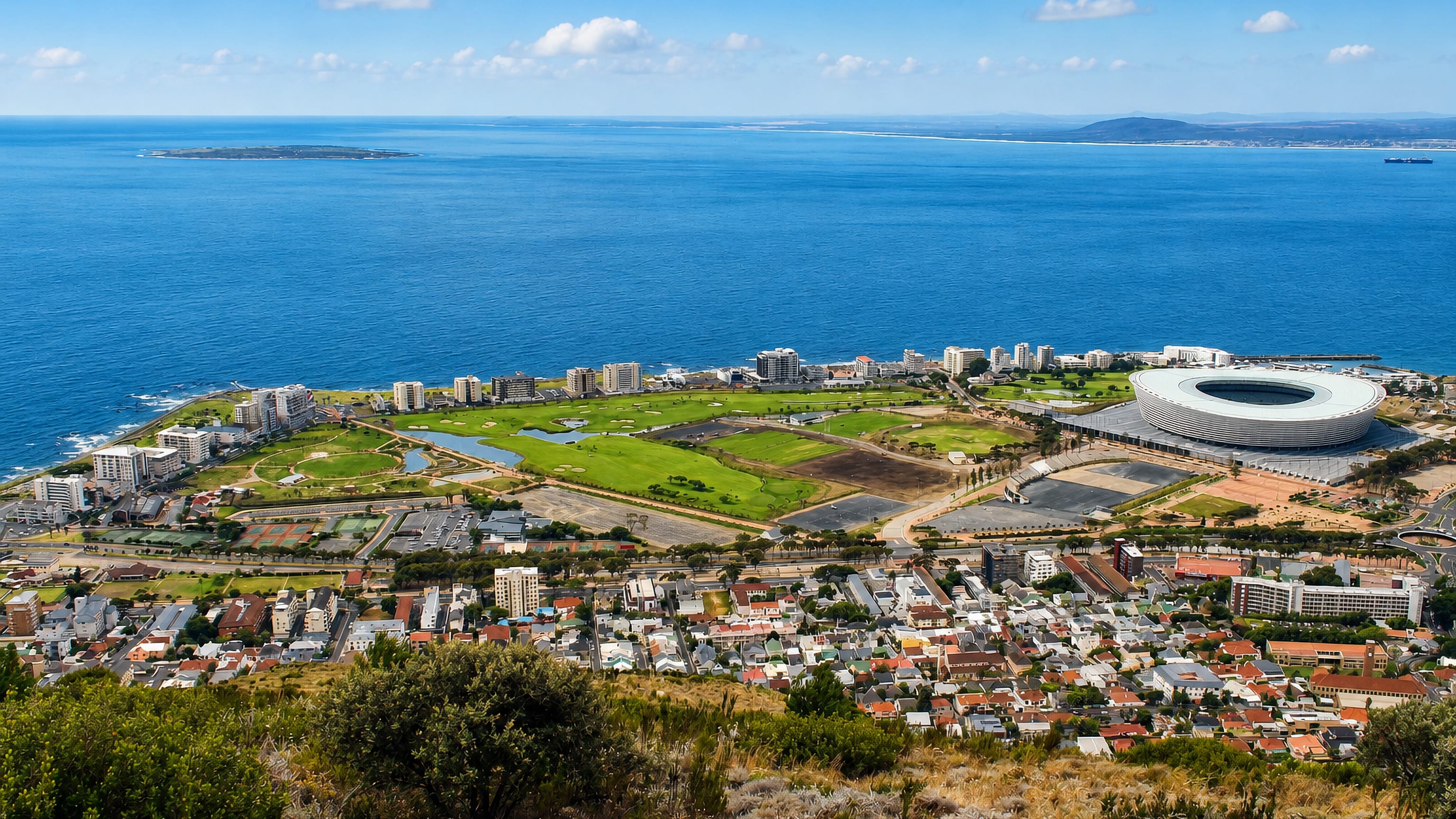 Green Point, Cape Town, from Signal Hill: the stadium, Green Point Common and Robben Island in the bay.