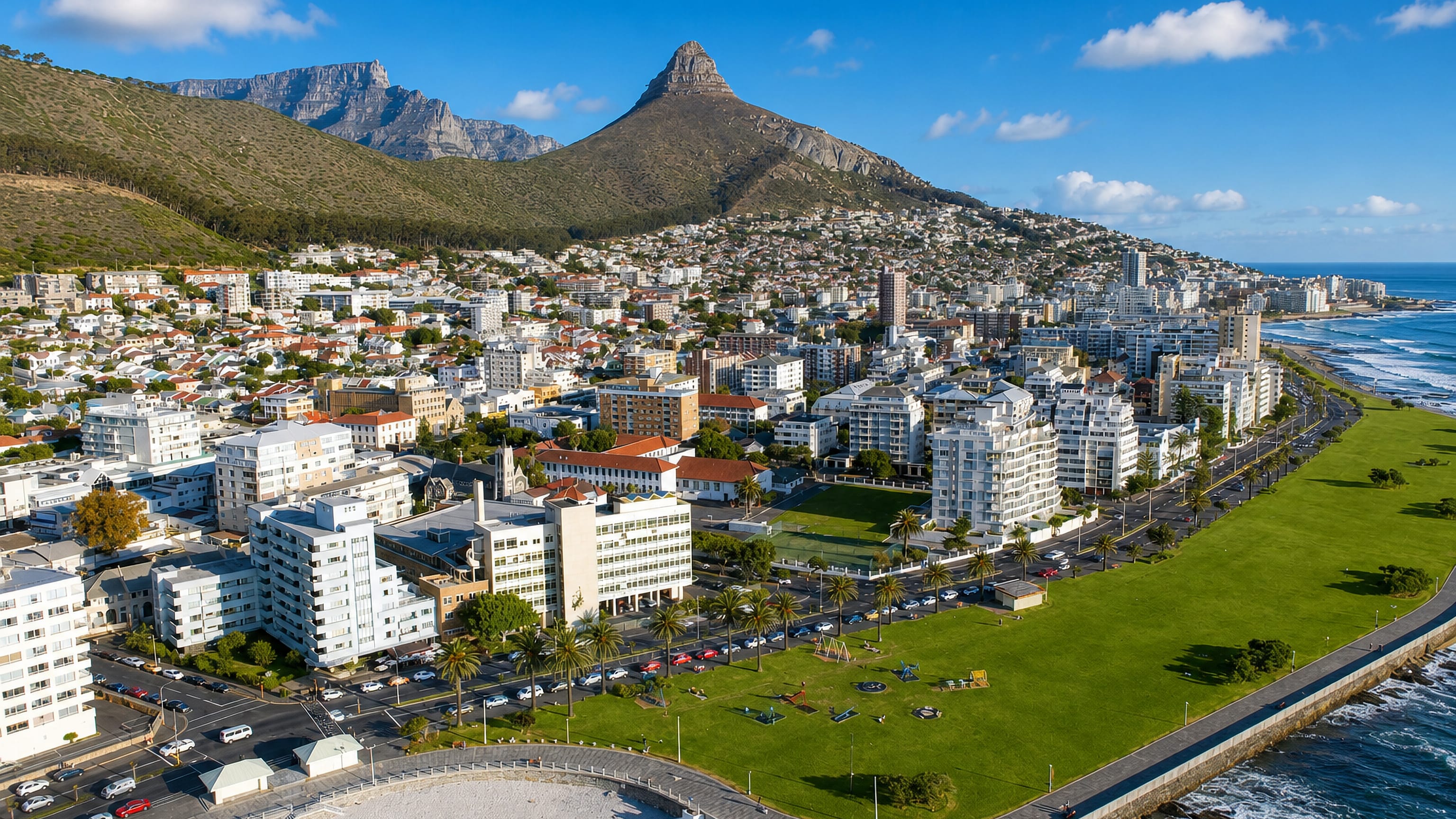 Aerial view of Sea Point, Cape Town, with the seafront promenade lawns below Lion's Head and Table Mountain